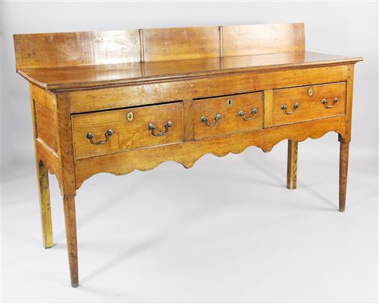 A 19th century Continental fruitwood dresser, probably French, W.5ft 4in.